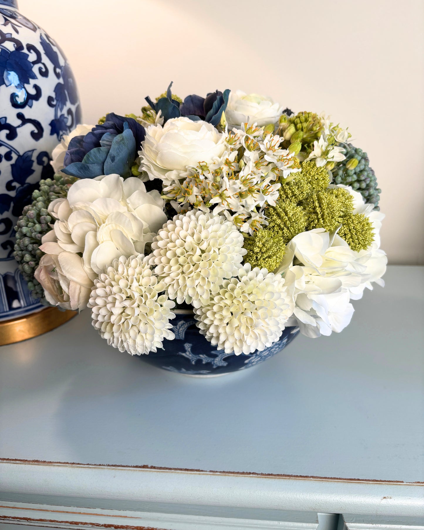 Sedum, Hydrangea, Ranunculus, and Blackberry in Blue/White Bowl