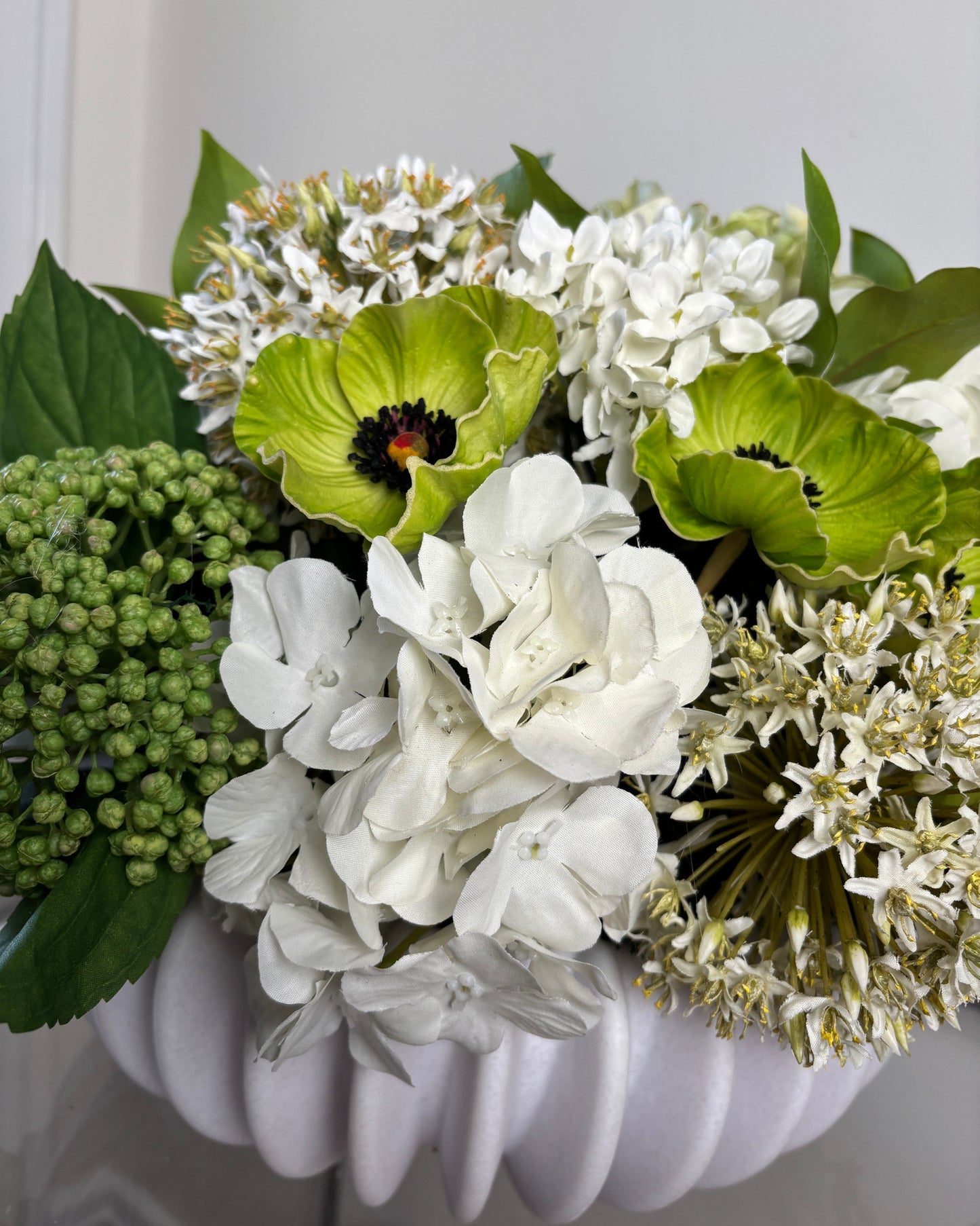 Hydrangea, Allium, Sedum, & Poppies in Matte White Fluted Vessel