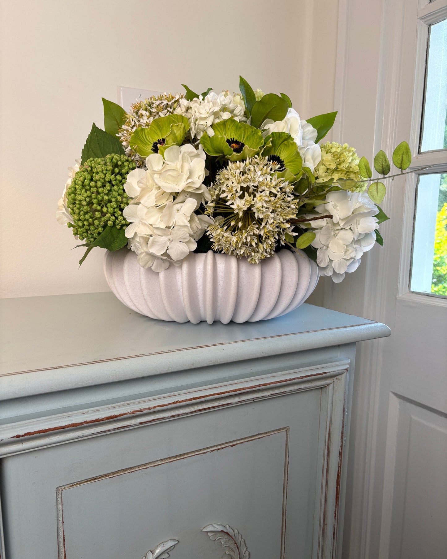 Hydrangea, Allium, Sedum, & Poppies in Matte White Fluted Vessel