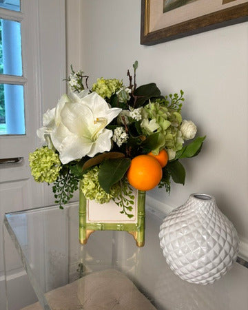 Amaryllis, Hydrangea, and Oranges in Bamboo Cache Pot