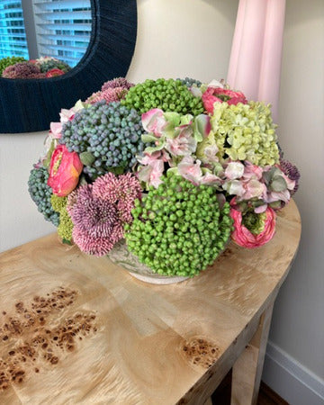 Sedum, Hydrangea, and Ranunculus Mounded in Green & White Bowl